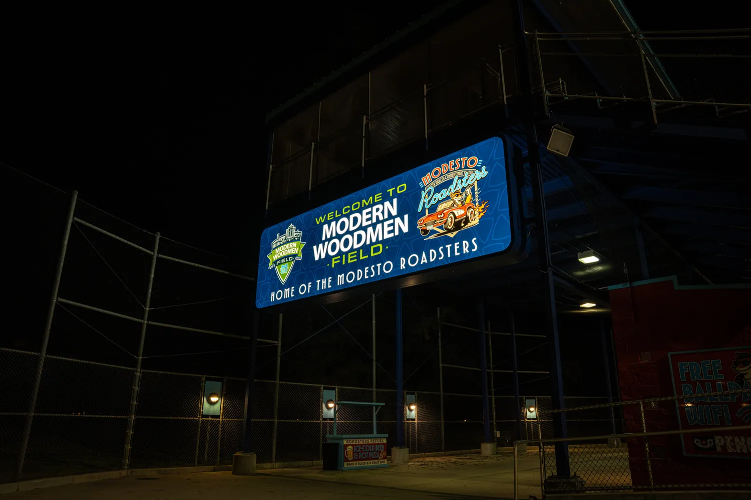 The welcome sign lit above the grandstand.